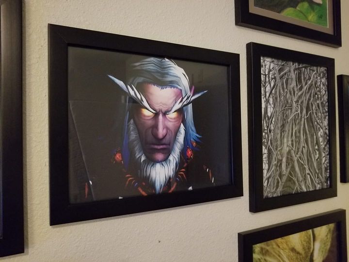 Finally, I got the portrait of my main framed and hung.